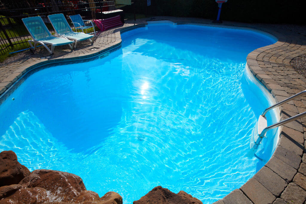 The Summer Pool Paradox: Why Are We Cooking Ourselves to Keep Our Pools Clean?